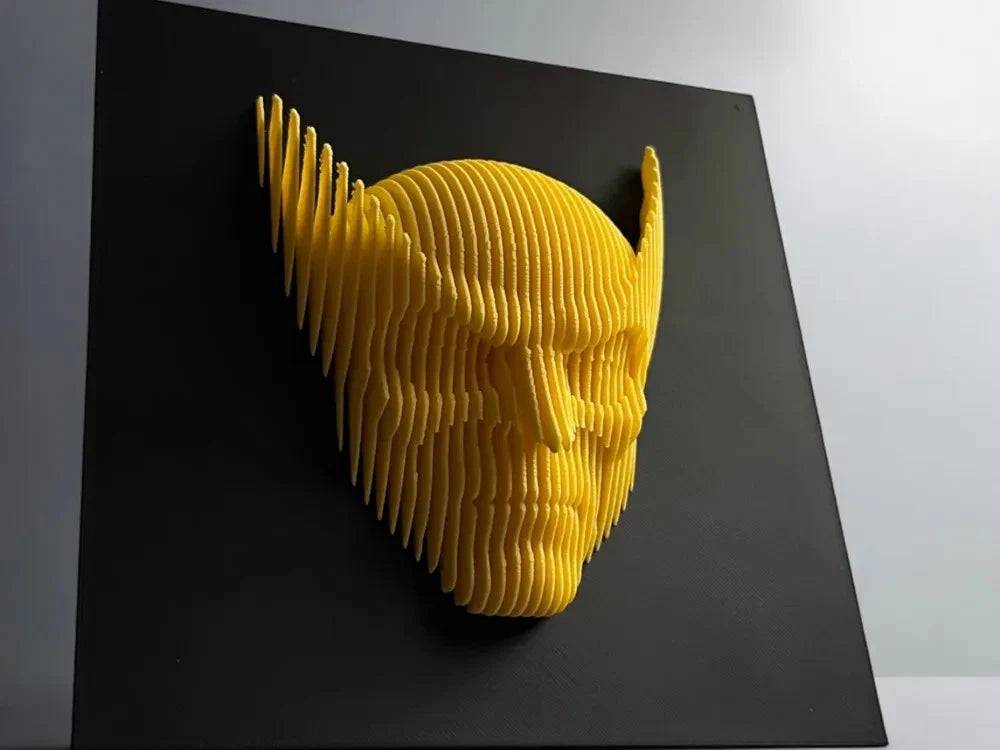 Wolverine Yellow 3D paper sculpture of a face on a black background
