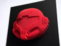 Samus Red 3D-printed object on a black surface