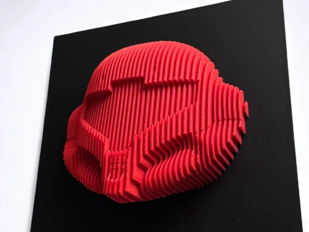 Samus Red 3D-printed object on a black surface
