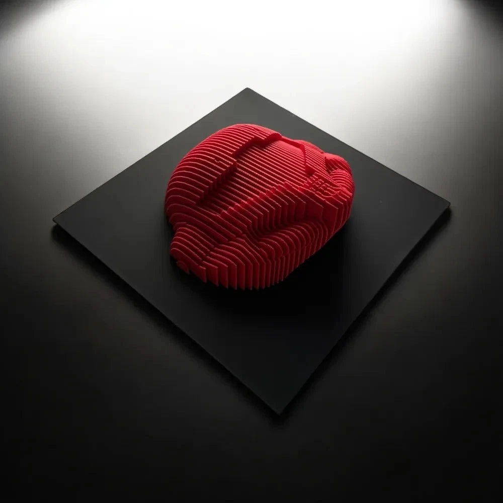 Samus Red textured object on a black surface with a dark background