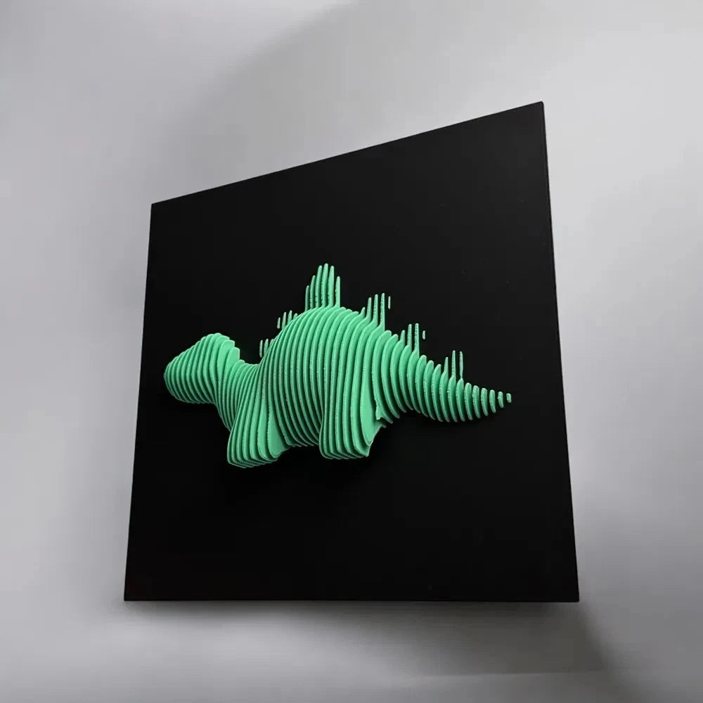 Stegosaur Green dinosaur-shaped sculpture on a black square background